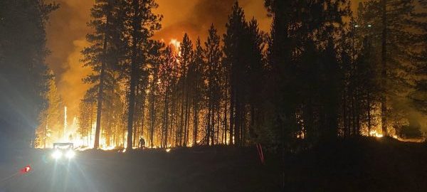 Extreme’ wildfires and heavy smoke grip western US and Canada