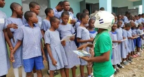 Motorcyclist Donates Writing Materials To Oyo State Pupils